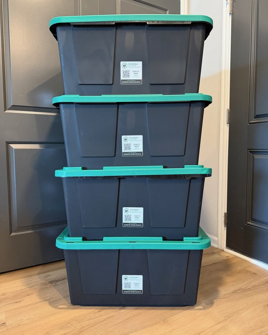 Stack of clean Tote Rentals moving totes